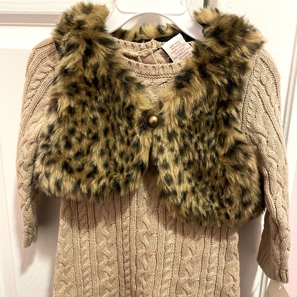 Sweater Dress with hat and animal print vest.